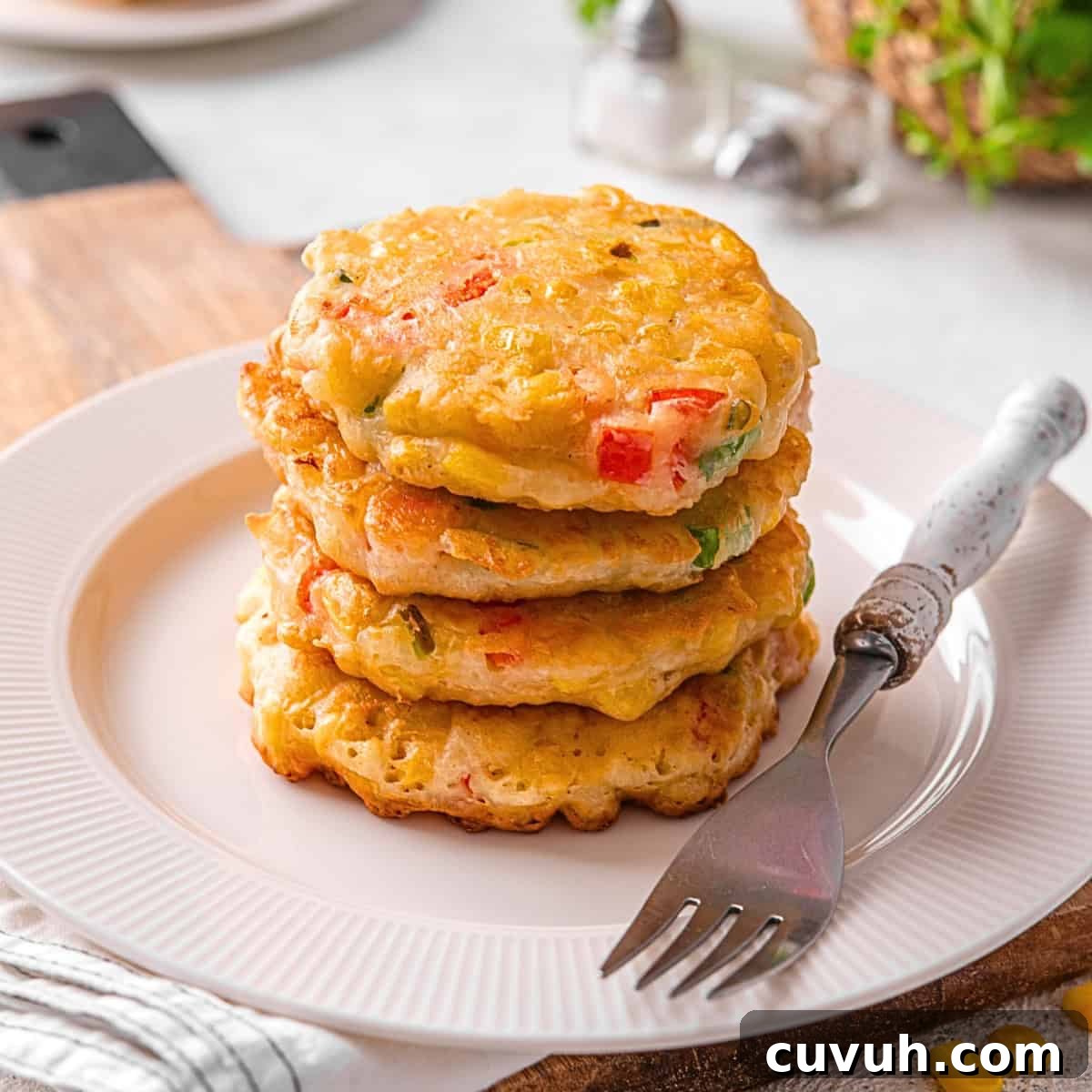Sweetcorn fritters on a plate.