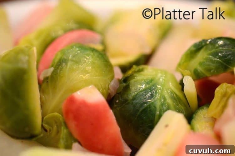 Slow-Braised Vegetables with Garlic and Herbs 4 A closeup of Brussels sprouts and radishes