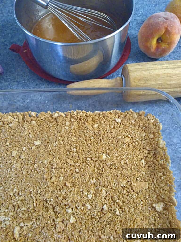 making peach delight, crust in a 9x13" pan and peach sauce in a saucepan.