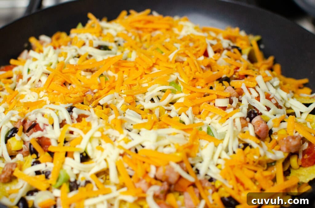 Brunch Nachos: Loaded Breakfast Nachos with Eggs & Avocado 8 Grated red leicester and grated mozzarella on top of our breakfast brunch nachos