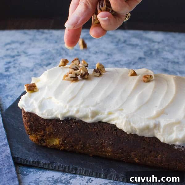 Moist Zucchini Bread Recipe with Brown Sugar and Cinnamon 11 sprinkling toasted nuts onUltra Moist Zucchini Bread