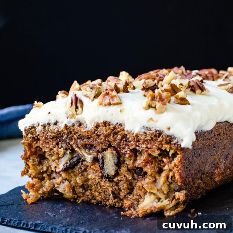 Moist Zucchini Bread Recipe with Brown Sugar and Cinnamon 15 I was slicing the moist zucchini bread with cream cheese icing.