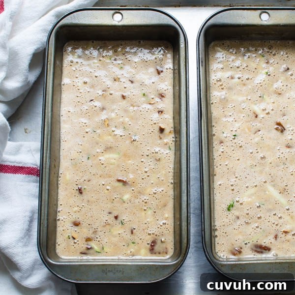 Moist Zucchini Bread Recipe with Brown Sugar and Cinnamon 7 Ultra Moist Zucchini Bread batter in two loaf pans.