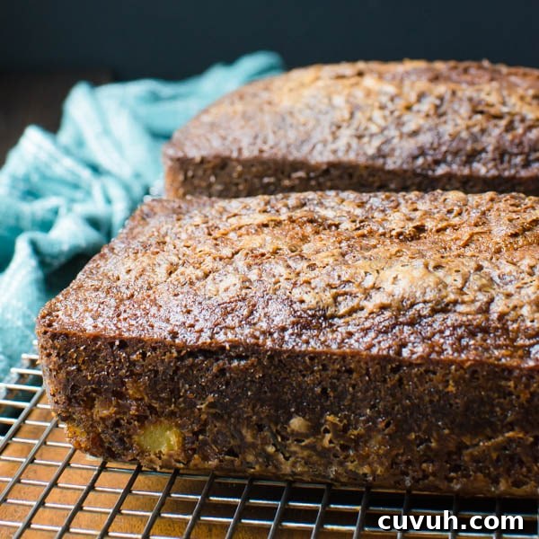Moist Zucchini Bread Recipe with Brown Sugar and Cinnamon 9 Two Ultra Moist Zucchini Breads cooling on a rack.