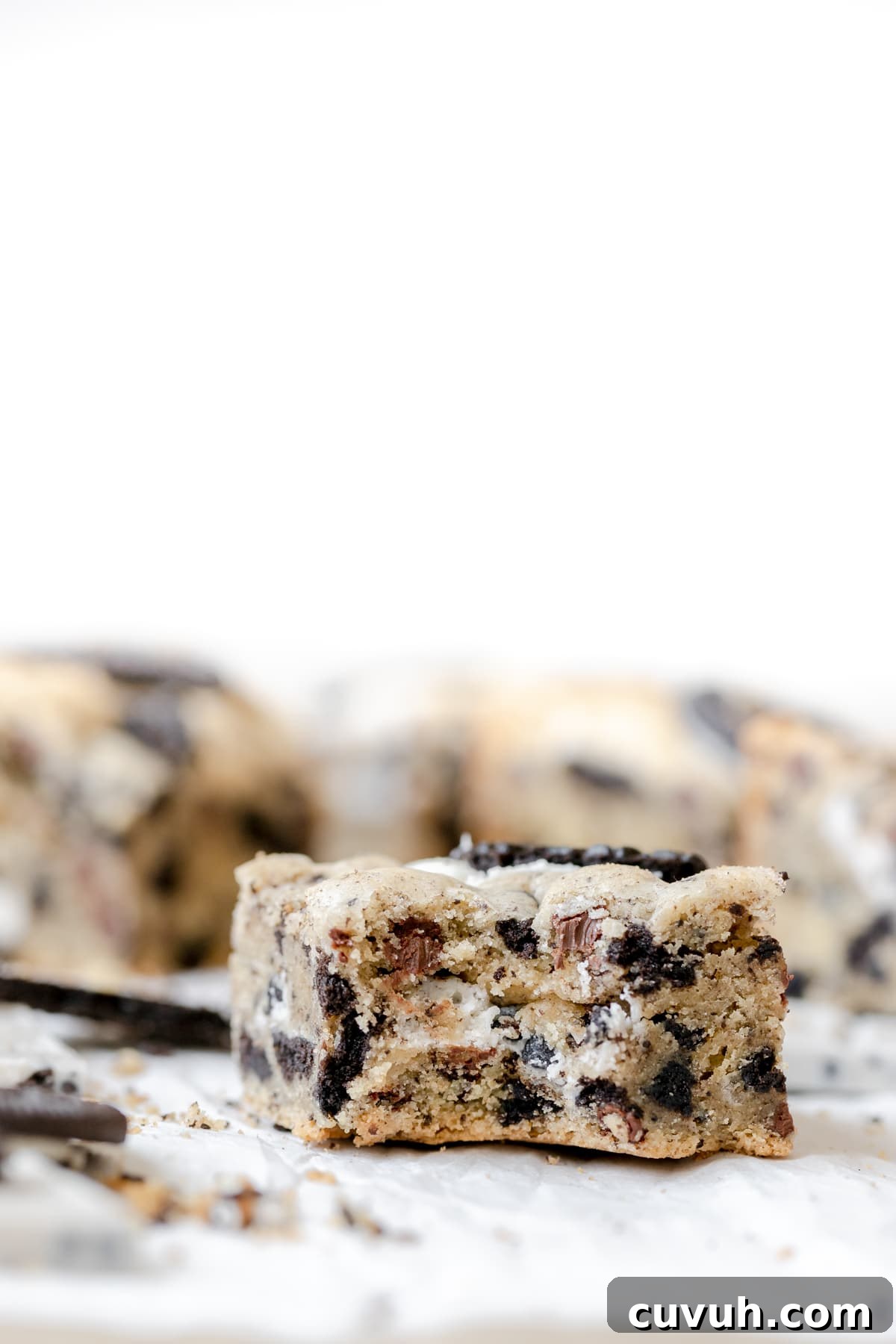 a bite taken from a cookies and cream bar