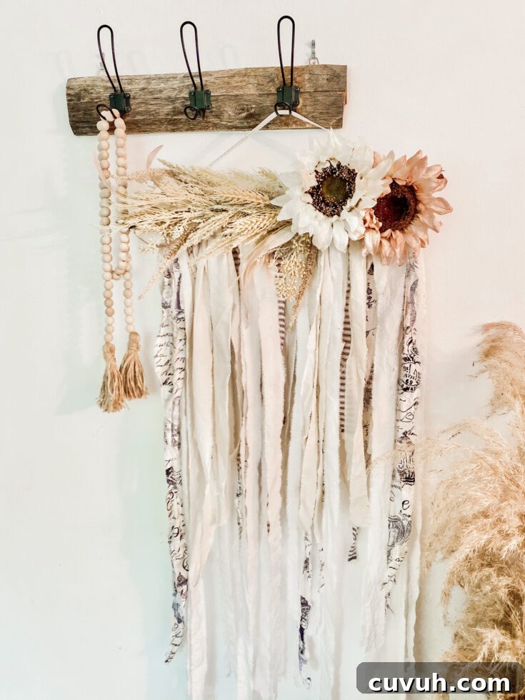 21 Chic DIY Summer Crafts to Refresh Your Home Decor 16 14. DIY Floral Wall Hanging