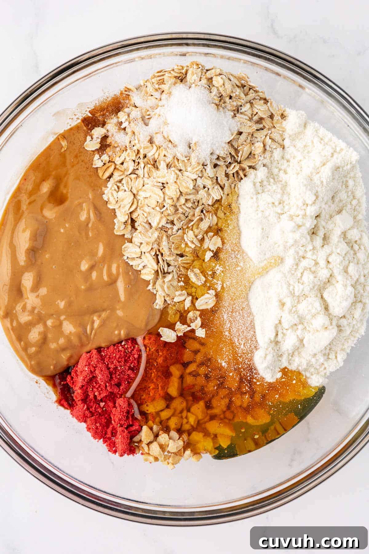energy bite ingredients in a mixing bowl