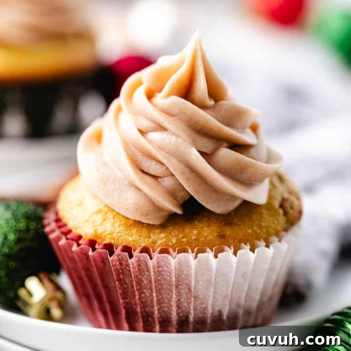 Close up view of a cupcake on a plate.