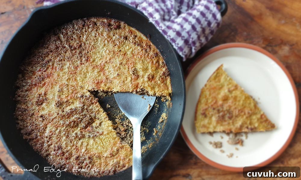 Liver Pâté Guide for Keto and Carnivore Diets: Recipes & Tips 11 Organ meat pie in a pan with a sliced placed on a plate.