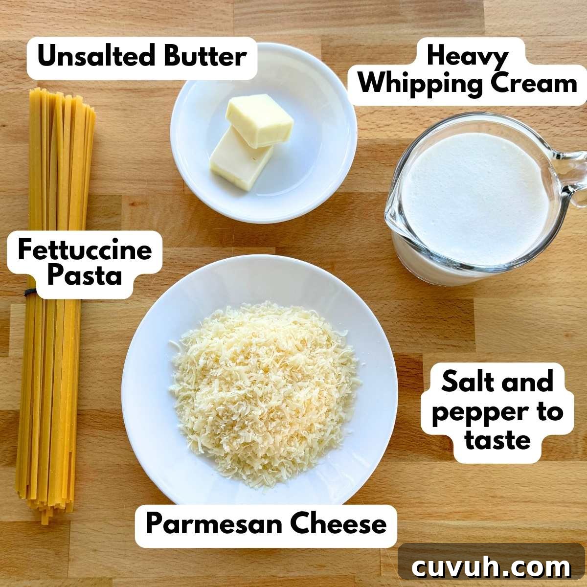 Labeled Ingredients to make fettuccine alfredo in one pot: fettuccine pasta, butter, heavy whipping cream, grated Parmesan cheese.