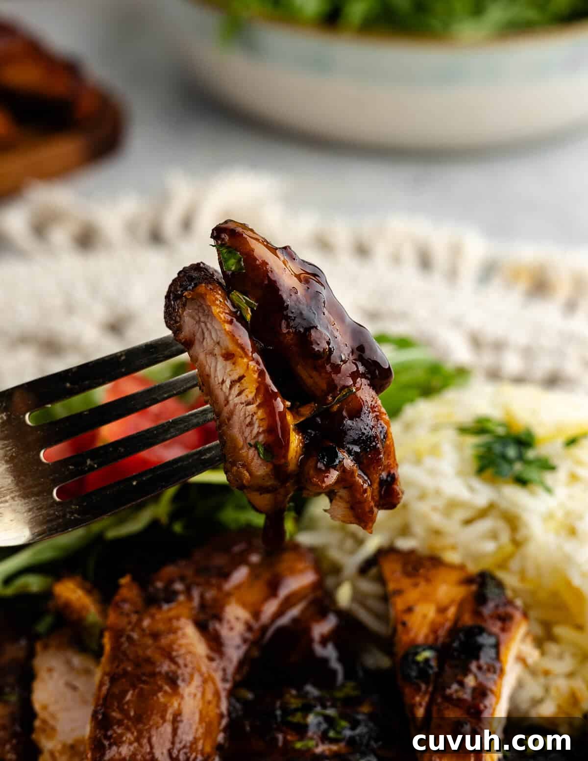 Honey Chipotle Glazed Chicken Thighs Recipe 4 a forkful of honey chipotle chicken.