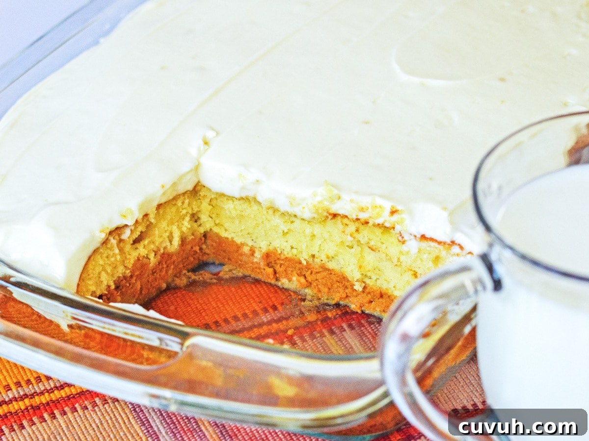 Pumpkin Magic Cake in pan with slices missing
