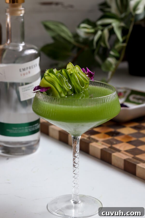 Crab Rangoon Taquitos with Sweet Chili Honey Glaze 7 Cucumber martini made gin but you can make it with vodka, garnished with edible flowers and sliced cucumber.