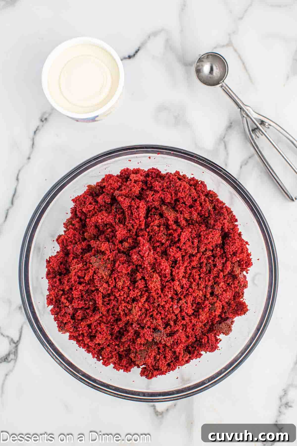 Mixing bowl with crumbled cake. 