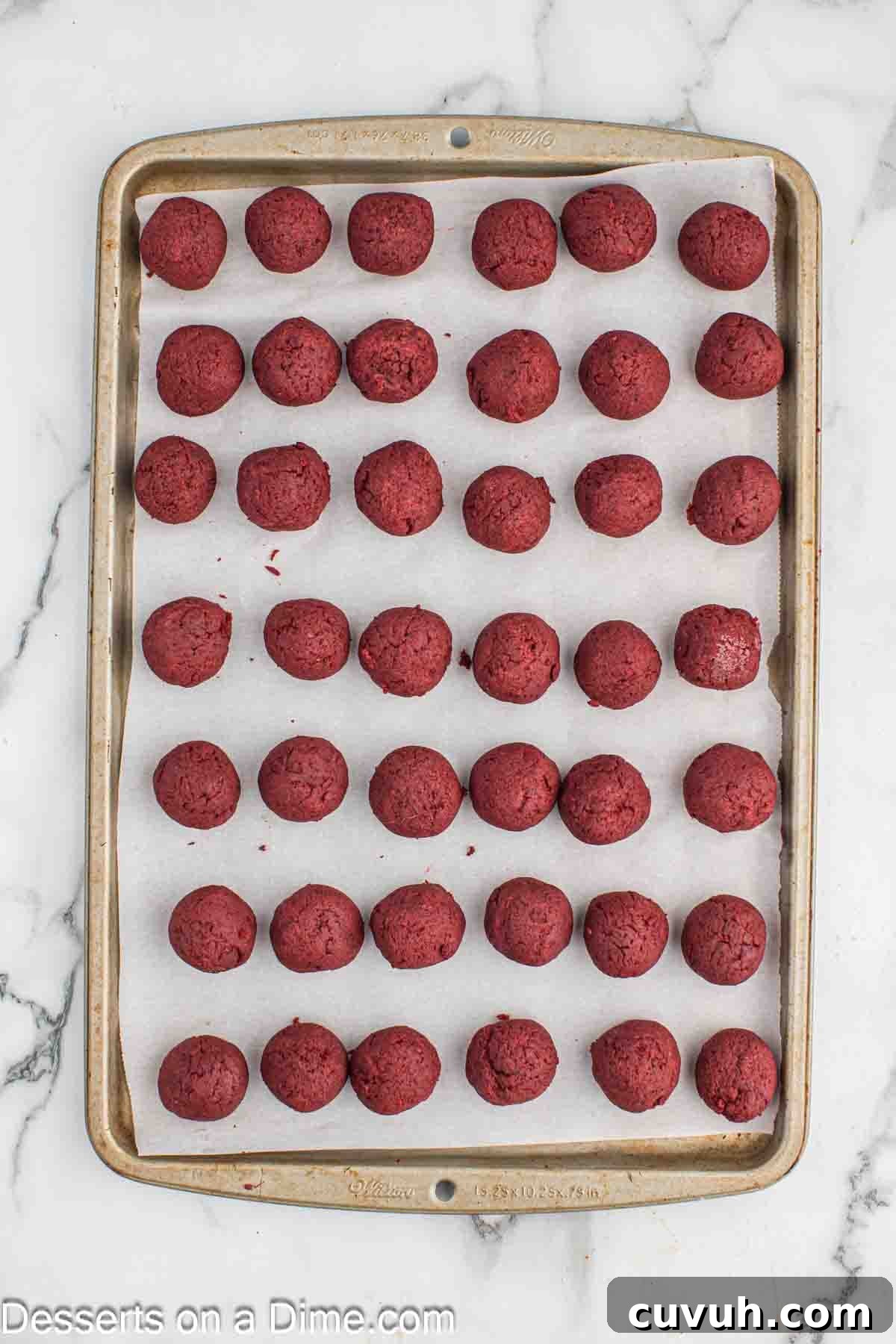 Cake Balls on a cookie sheet. 