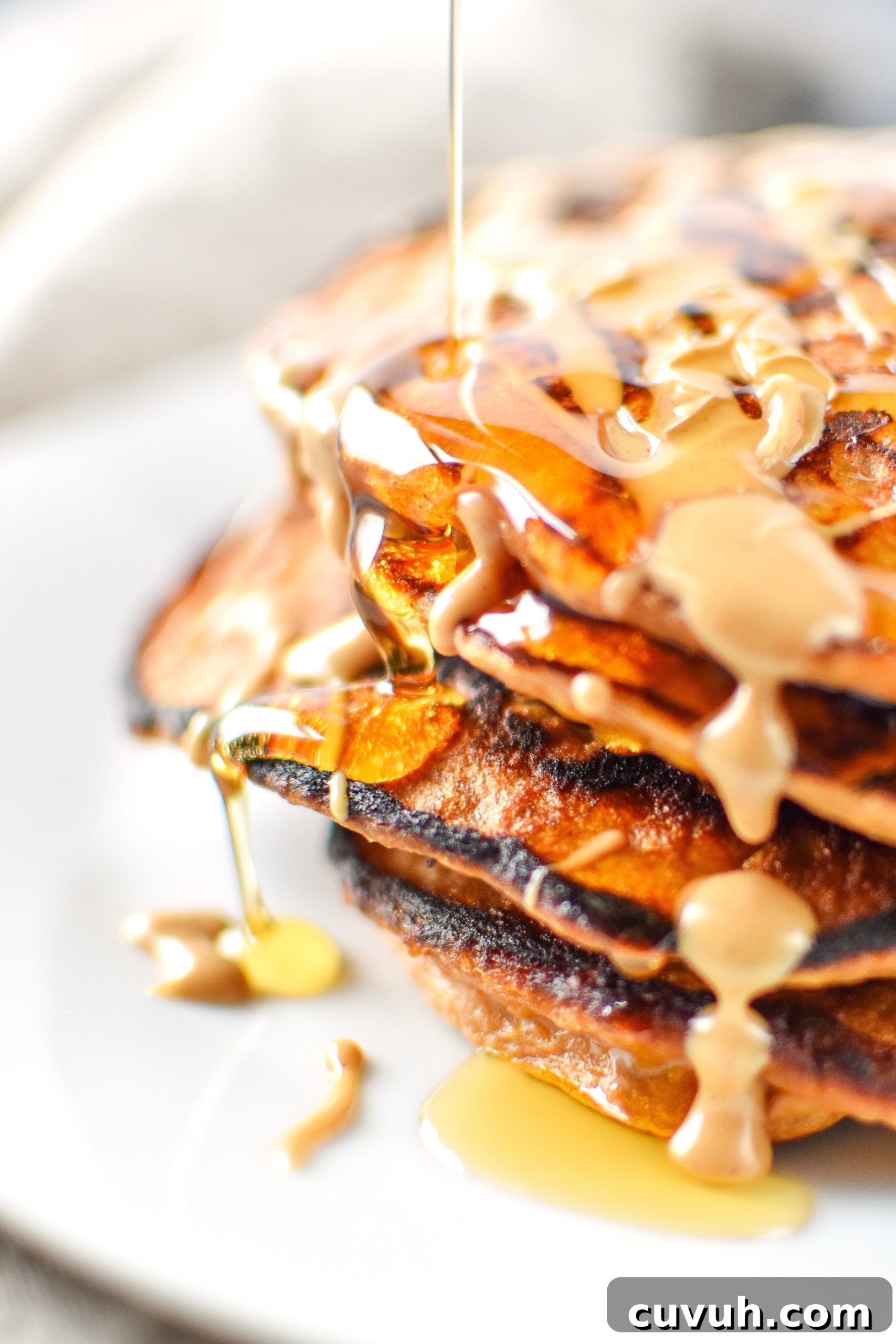 5-Ingredient Sweet Potato and Banana Pancakes Recipe 5 5-Ingredient Sweet Potato Banana Pancakes - Banana, sweet potato, nut butter, eggs and cinnamon are all you need to make these simple pancakes happen. Maple syrup drizzled on top is the best!