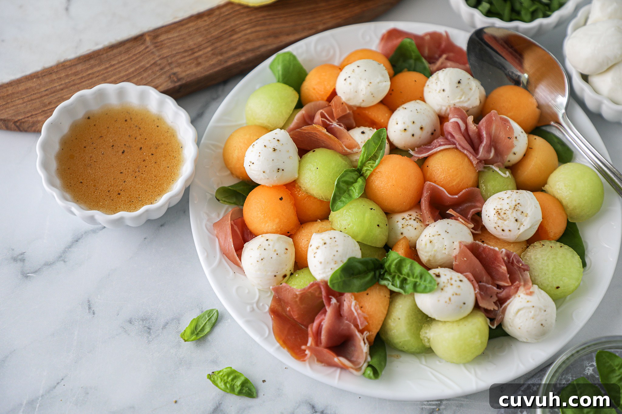 These easy melon salad is about to because your favorite summer side dish! It uses 2 different types of melon and is tossed in a sweet lemon honey vinaigrette!