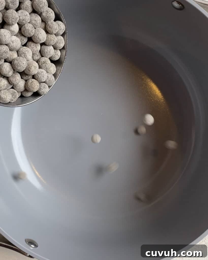process of adding tapioca balls to pan
