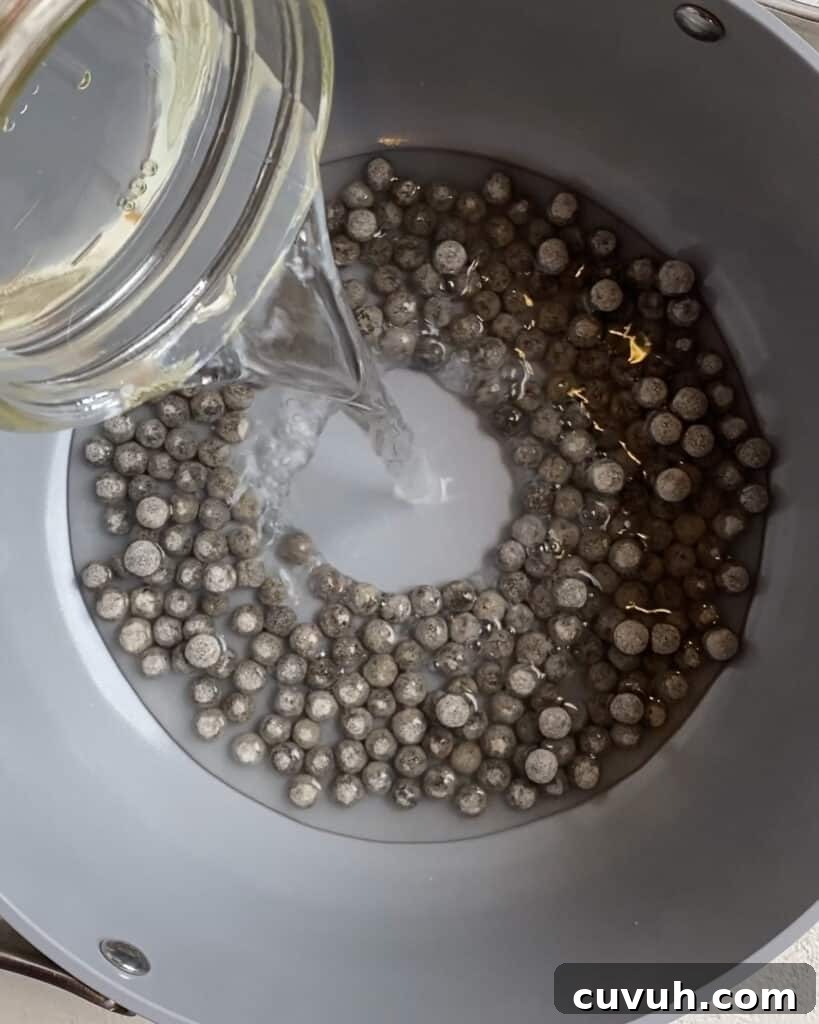 process of adding water to pan of tapioca balls
