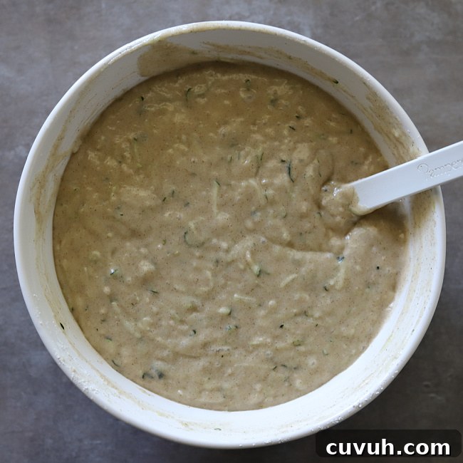 gluten-free zucchini bread batter in large mixing bowl