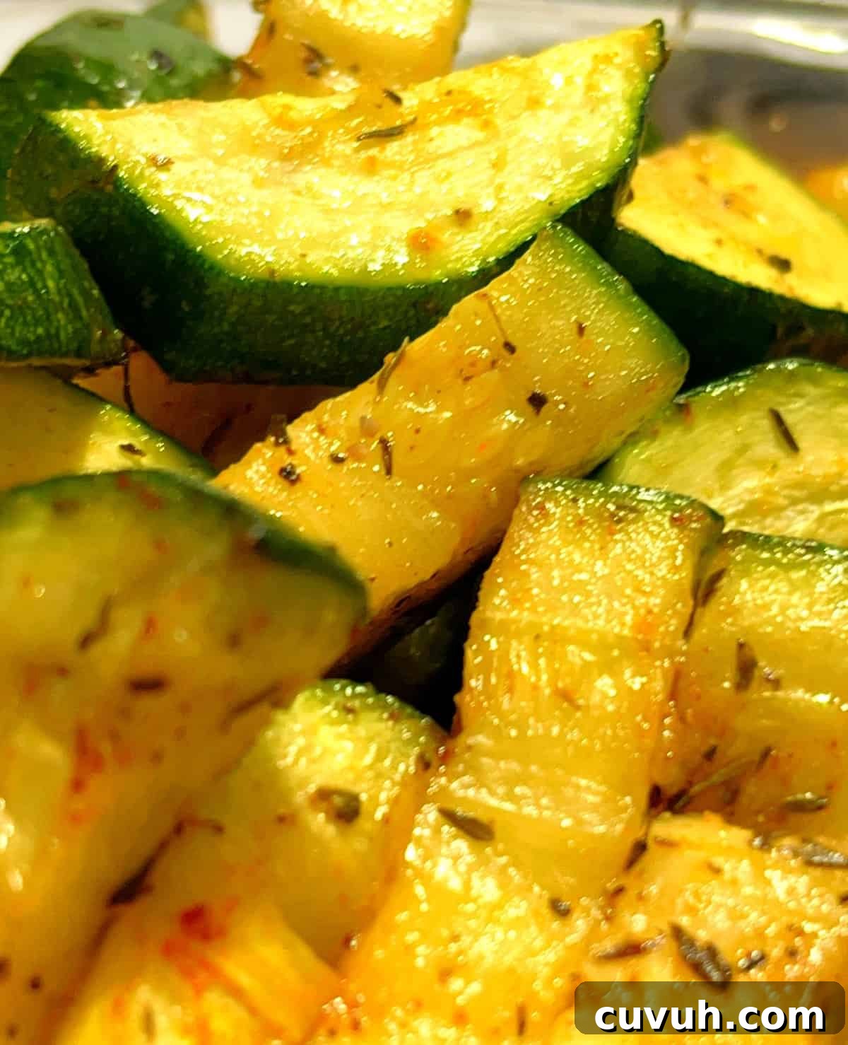 closeup of zucchini in the air fryer ready to eat