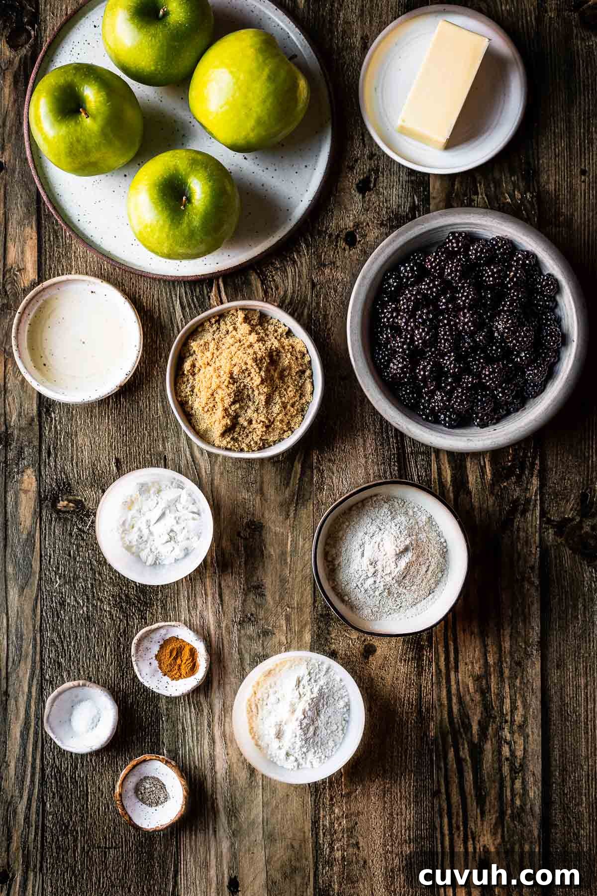 Apple and Blackberry Crumble Recipe for Perfect Autumn Dessert 3 Ingredients for a berry apple crumble in bowls and plates.