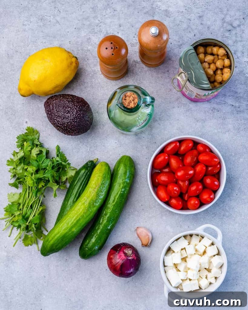 Salad ingredients on a grey table.