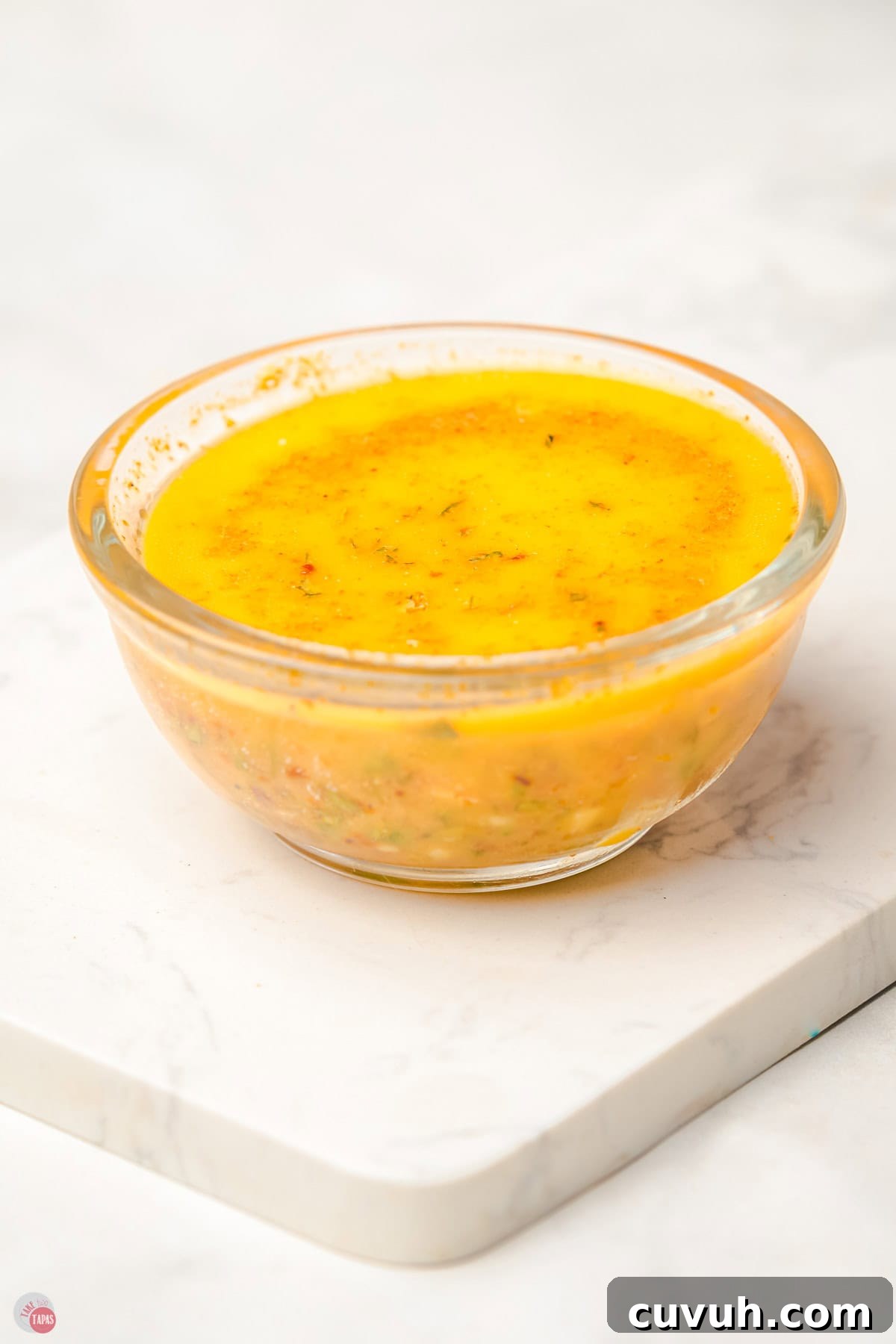 melted butter in a small clear bowl