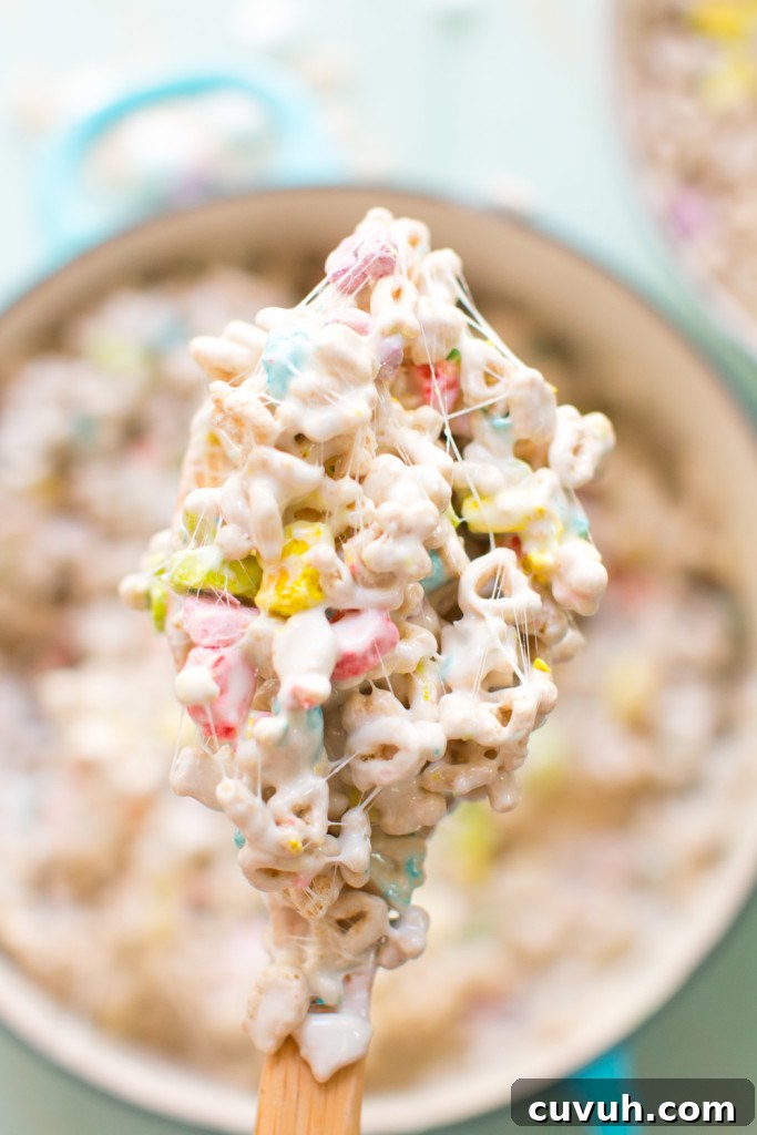 Lucky Charms S'mores Treats: Magic Marshmallow Dessert Recipe 11 mixing Lucky Charms Treats