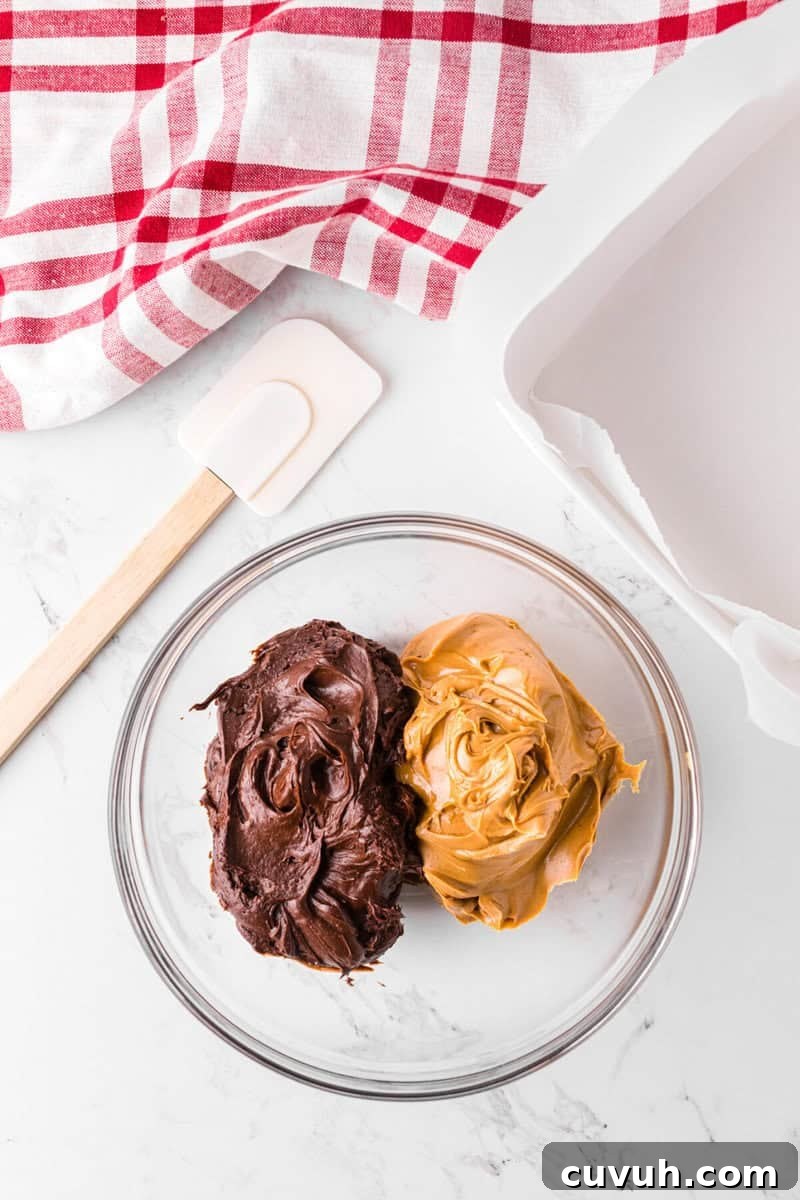frosting and peanut butter in a large glass bowl.
