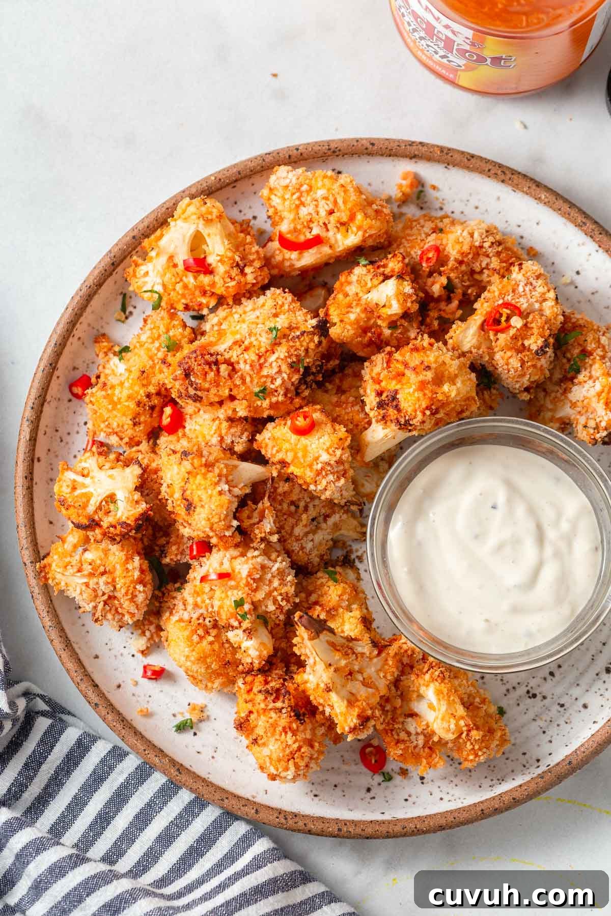 Crispy Air Fryer Buffalo Cauliflower Recipe 13 air fryer buffalo cauliflower bites with blue cheese dip.