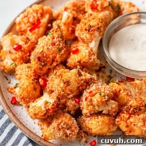 Crispy Air Fryer Buffalo Cauliflower Recipe 14 air fryer buffalo cauliflower on a plate.