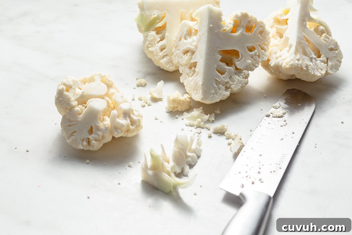 Crispy Air Fryer Buffalo Cauliflower Recipe 5 removing the stem of the cauliflower.