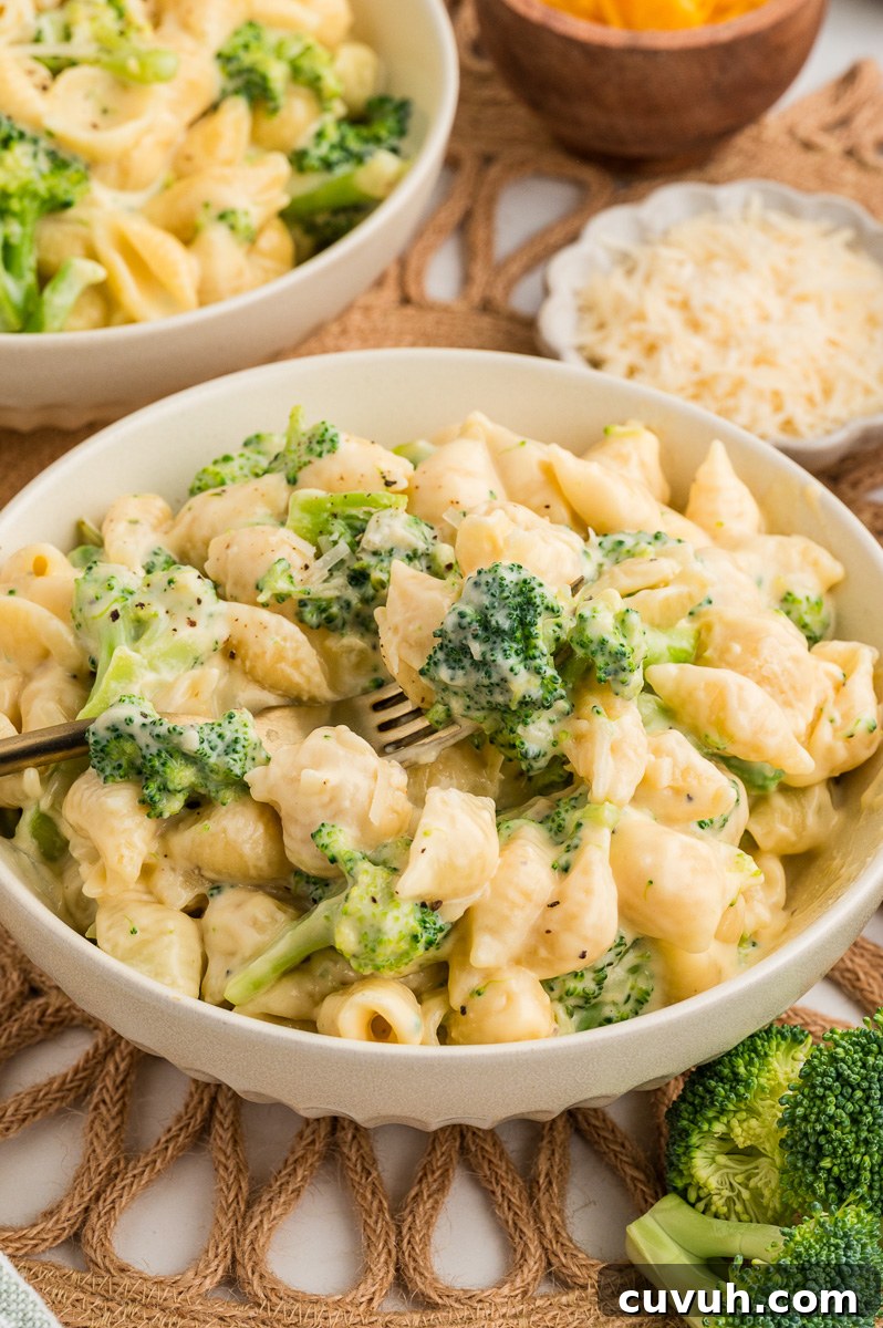 Broccoli mac and cheese in a bowl.