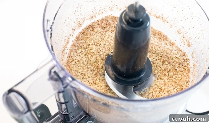 Pulsing almonds in a food processor