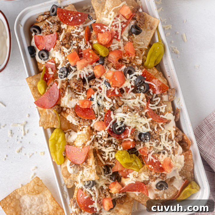 Meat and vegetables on top of chips