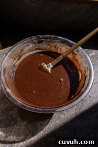 Fudgy Chocolate and Peanut Butter Cake Recipe That Melts in Your Mouth 9 Chocolate cake batter