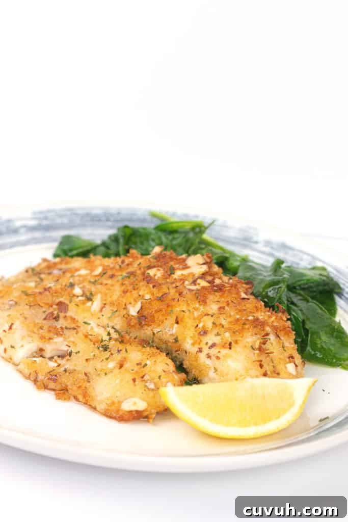 Almond crusted tilapia on plate