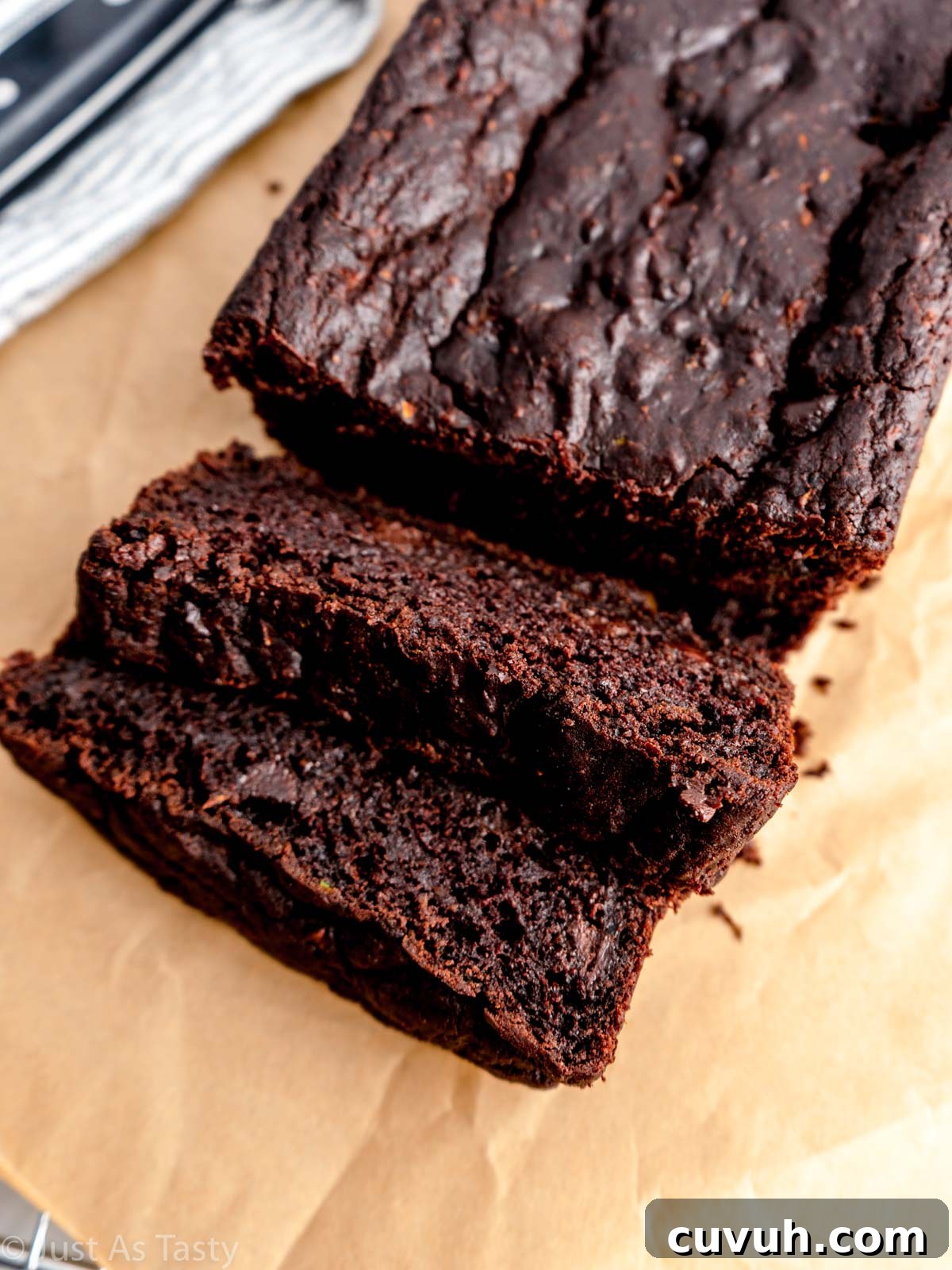 Ultra-Moist Double Chocolate Zucchini Bread — Gluten-Free & Eggless 6 Sliced chocolate zucchini bread.