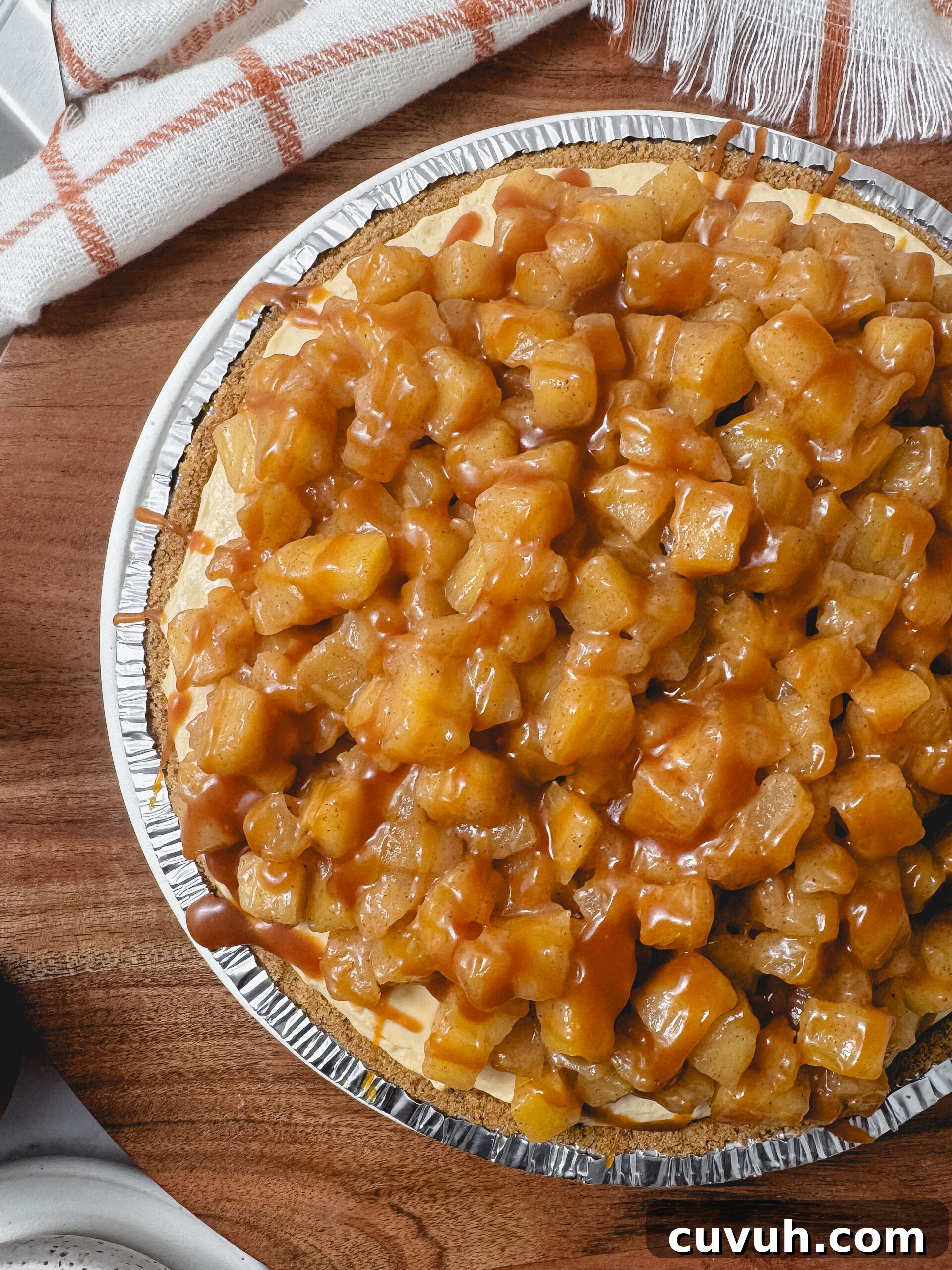 Caramel Apple Cheesecake Pie Recipe — Decadent Fall Dessert 3 Slice of caramel apple cheesecake pie