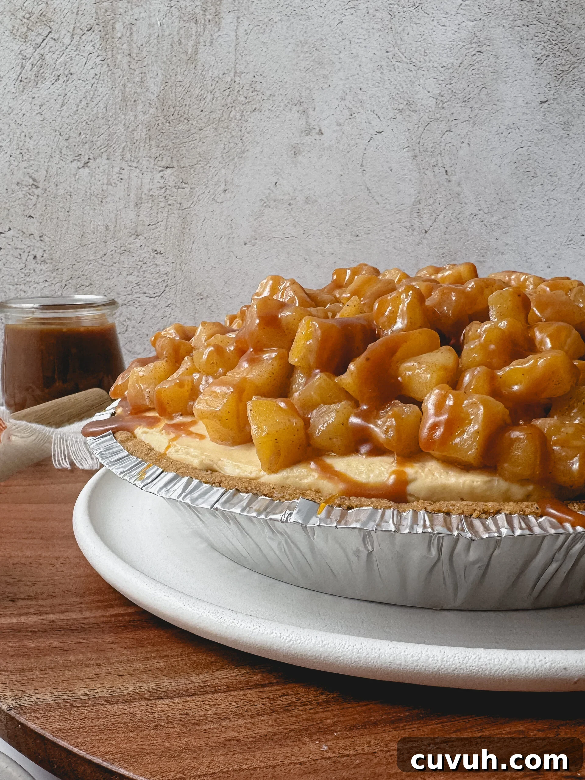 Caramel Apple Cheesecake Pie Recipe — Decadent Fall Dessert 5 Apple compote topping