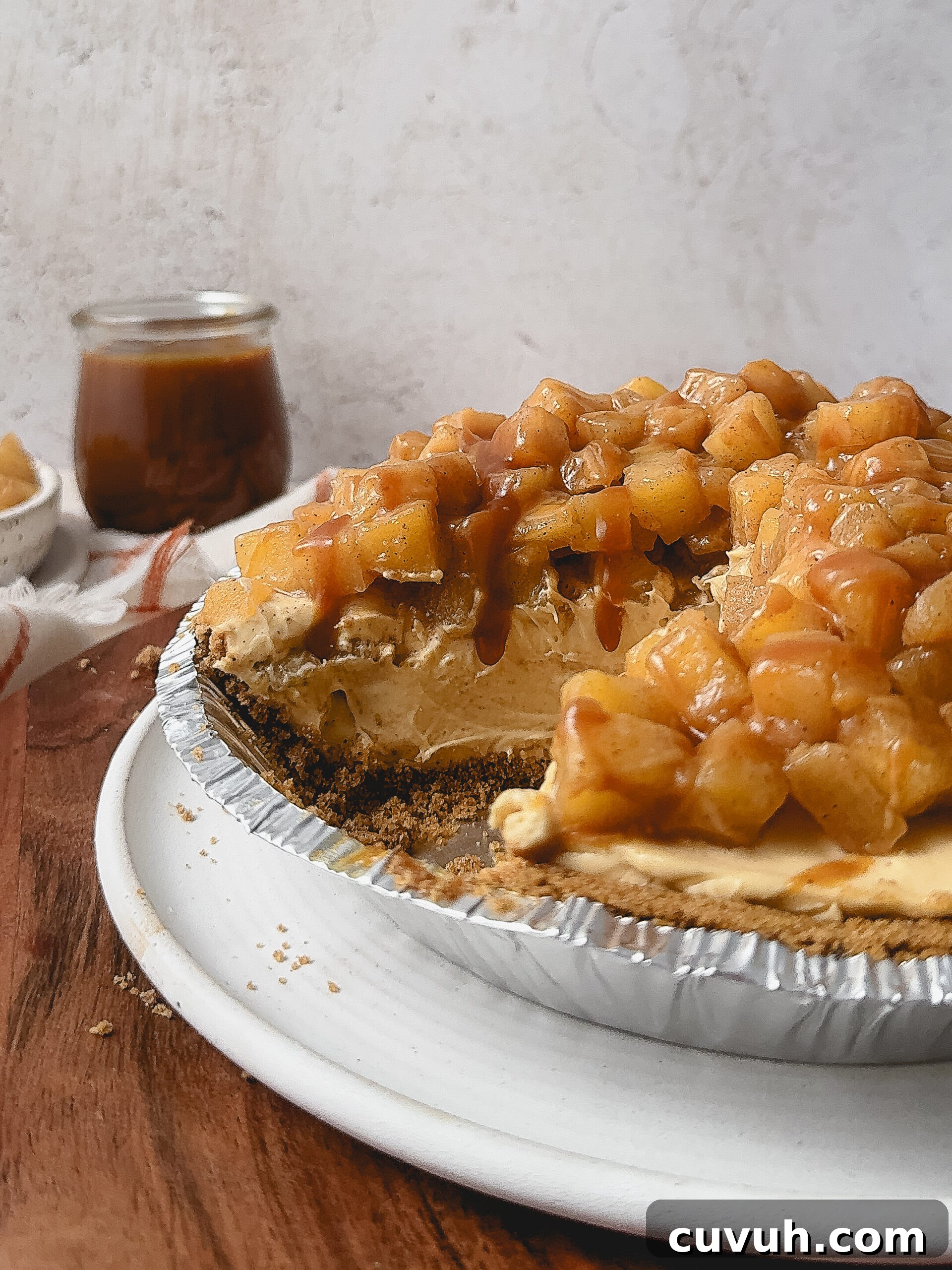 Caramel Apple Cheesecake Pie Recipe — Decadent Fall Dessert 6 Caramel drizzle on pie