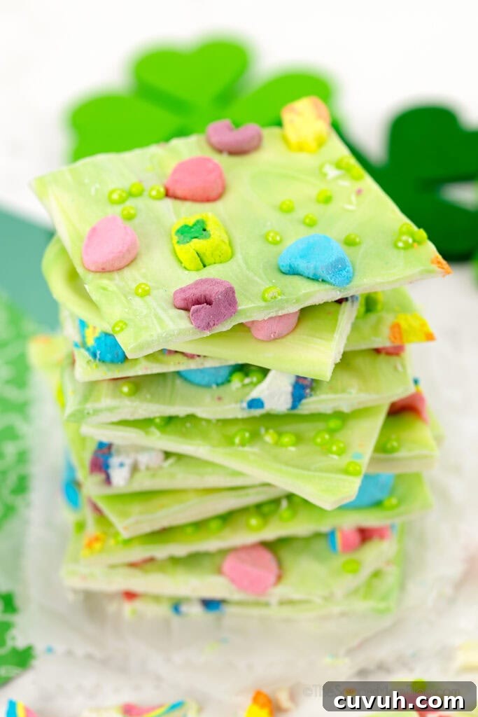 stack of green chocolate bark topped with Lucky Charms marshmallows.