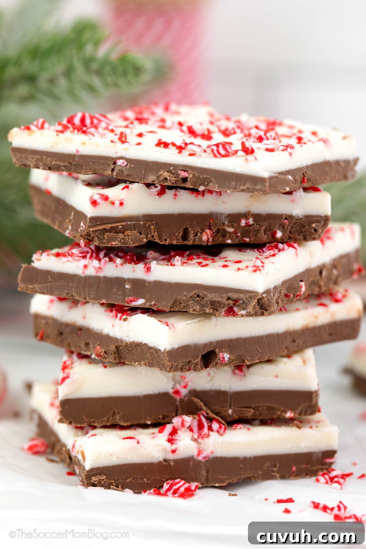 stack of homemade peppermint bark squares.