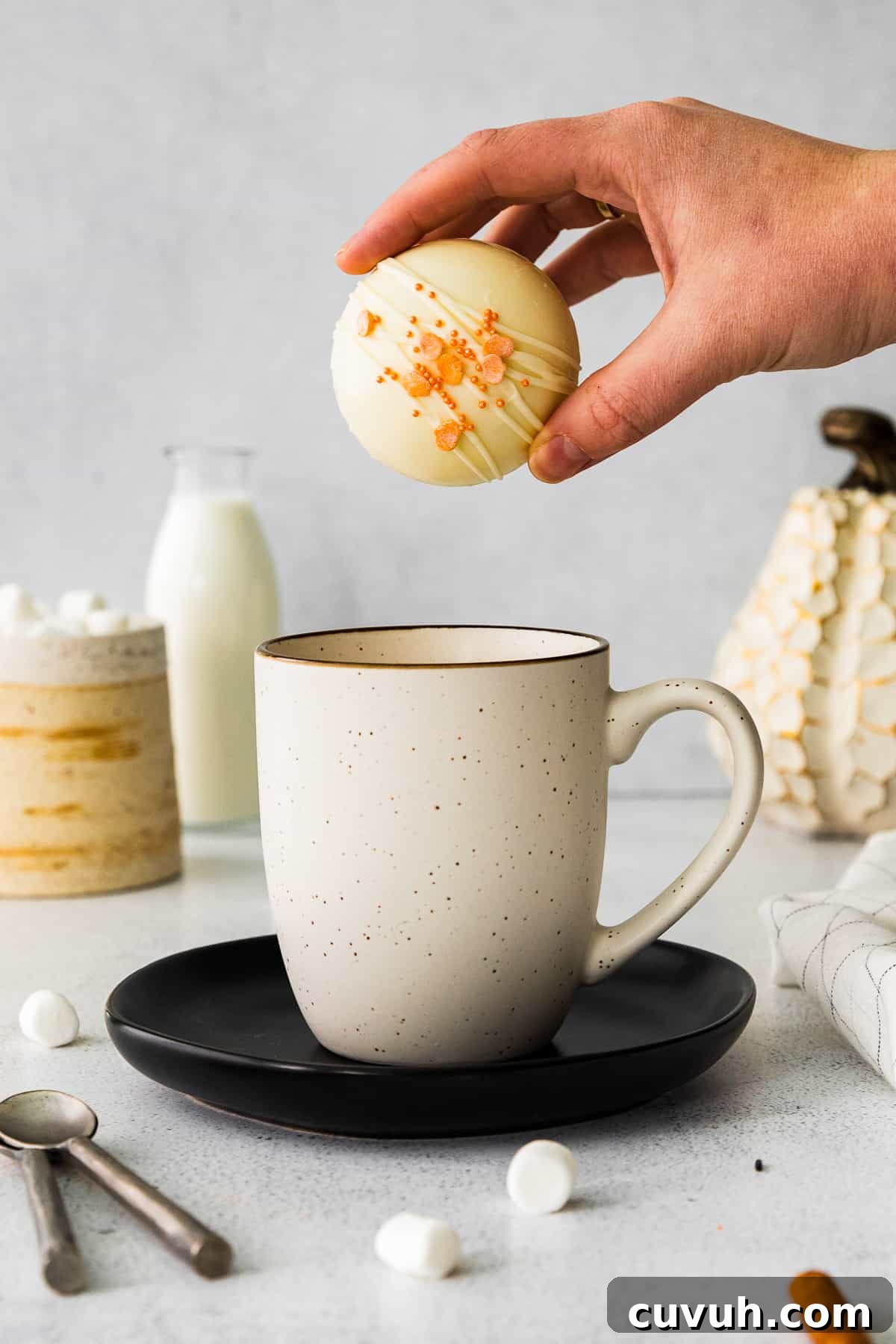 pumpkin hot cocoa bomb in mug