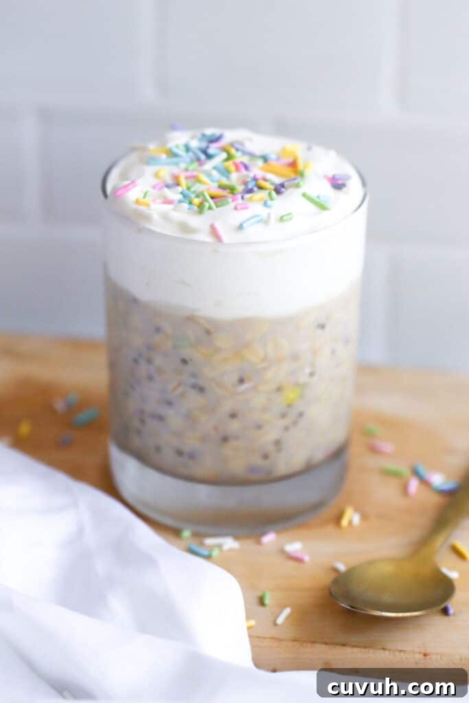 birthday cake overnight oats high protein birthday cake overnight oats in a mason jar topped with greek yogurt and rainbow sprinkles