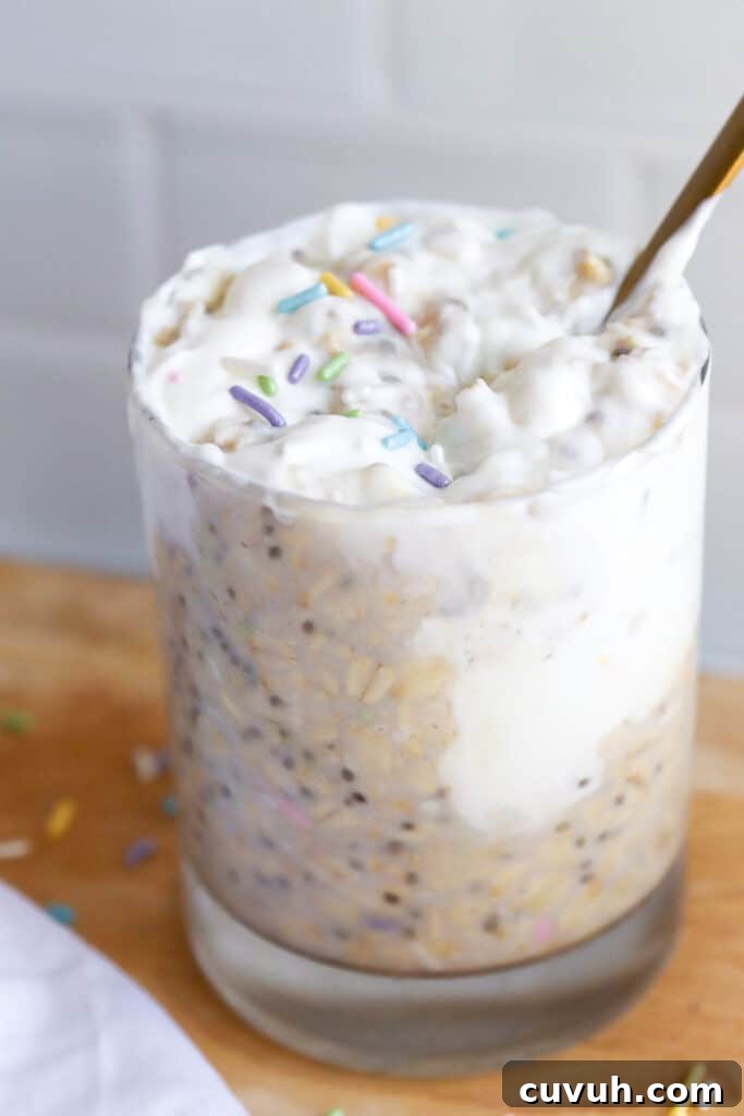 Birthday Cake Overnight Oats — High-Protein Breakfast Recipe 2 spoonful of birthday cake overnight oats with sprinkles