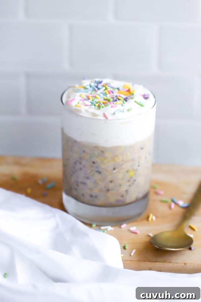 Birthday Cake Overnight Oats — High-Protein Breakfast Recipe 4 birthday cake overnight oats with thick greek yogurt layer and sprinkles in glass