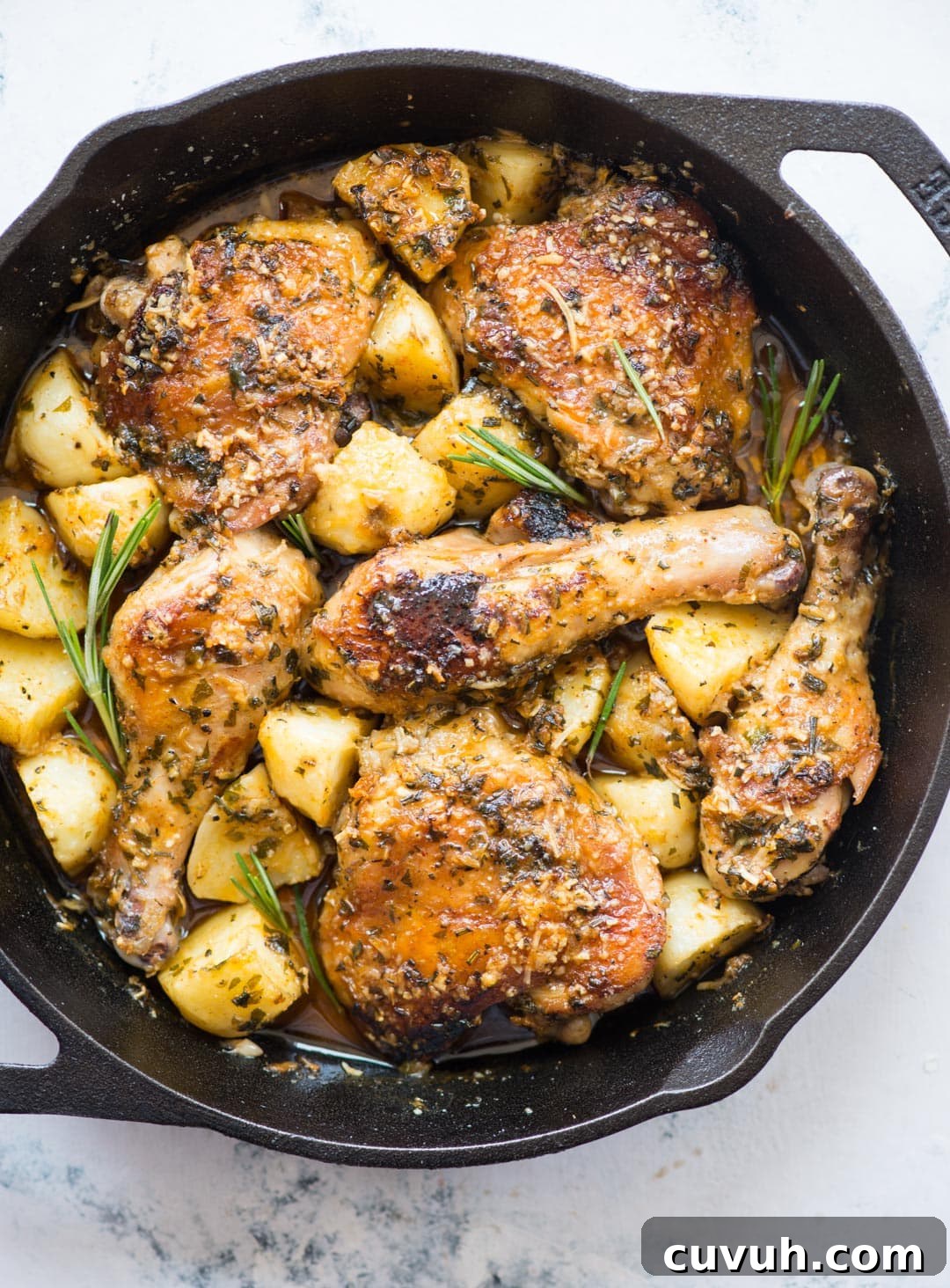 Garlic Parmesan Baked Chicken with Roasted Potatoes 2 Baked chicken and potatoes in a butter garlic herb sauce, crispy garlic parmesan crusted chicken is a delicious one-pan dinner and very easy to prepare.