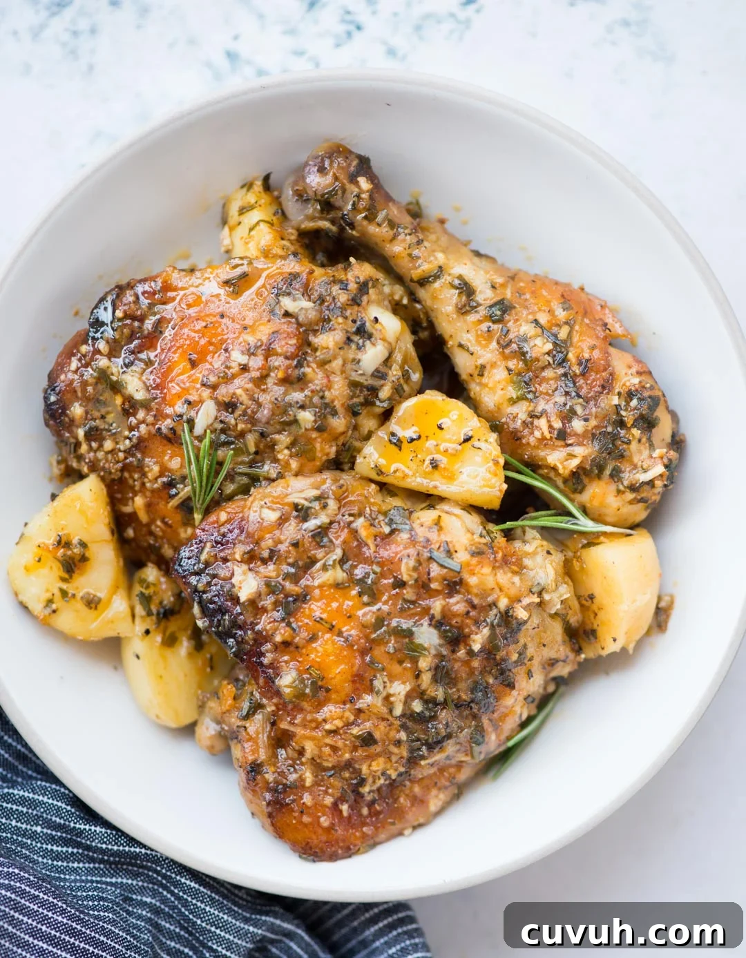 Garlic Parmesan Baked Chicken with Roasted Potatoes 4 Baked chicken and potatoes in a butter garlic herb sauce, crispy garlic parmesan crusted chicken is a delicious one-pan dinner and very easy to prepare.